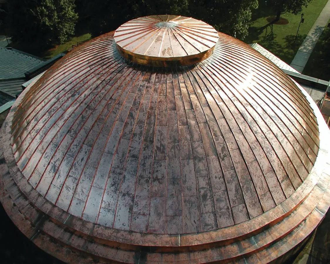 Craftsman Roofing crew installing a new roof in Wellesley Farms